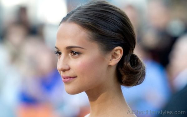 Alicia Vikander Pinned Bun Hairstyle 