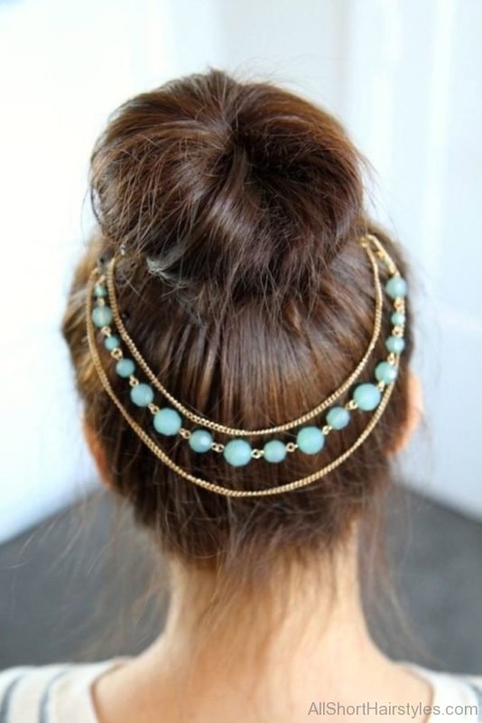 Bun With Beads Hairstyle