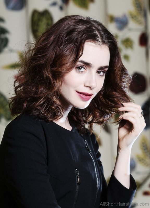 Lily Collins Loose Curls Hairstyle 