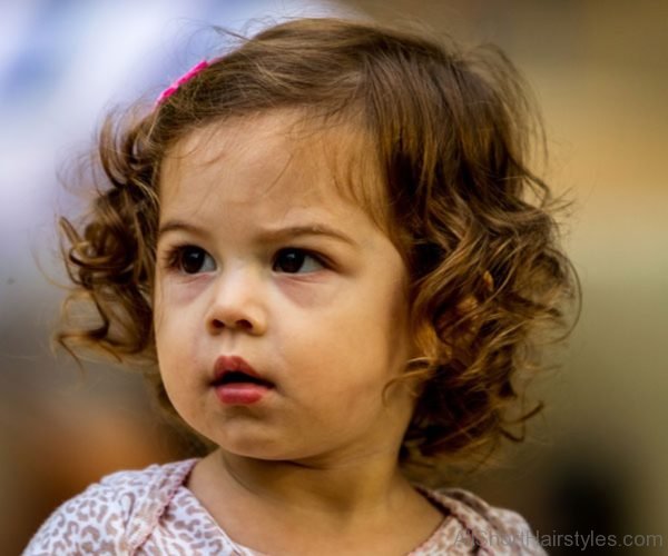 Little Baby Girl In Curly Hairstyle 