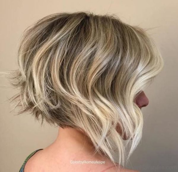 Ash Blonde Wavy Angled Bob Hairstyle 