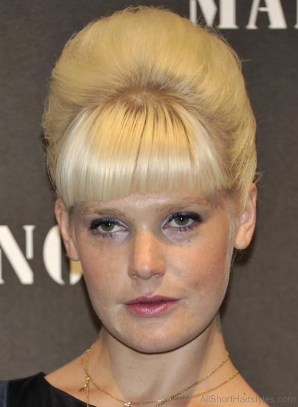Blonde Beehive Updo Hairstyle with Heavy Fringes