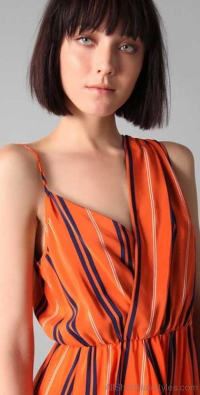 Blunt Line Dark Bob Hairstyle with Bangs