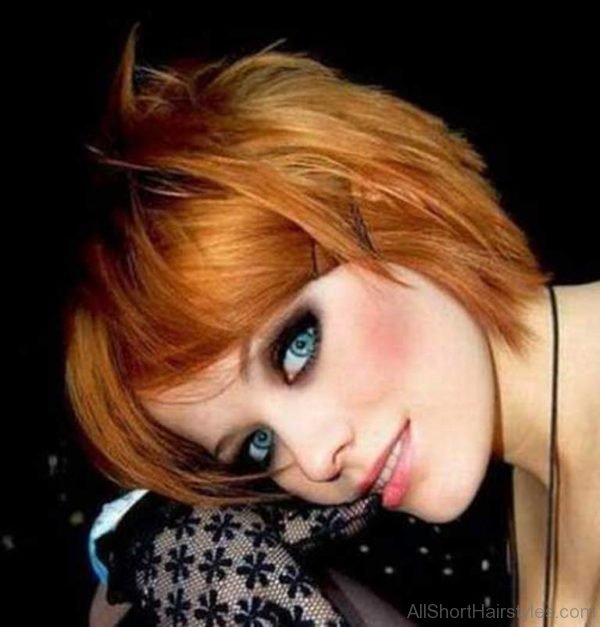 Cute Short Emo Layered Ginger Hairstyle