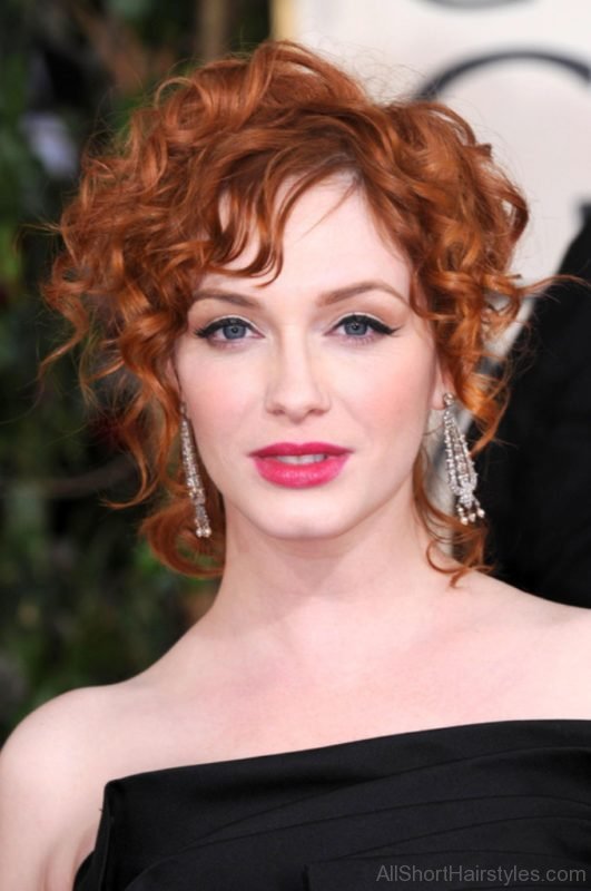 Red Spiral Curls Pinned Up Hairstyle