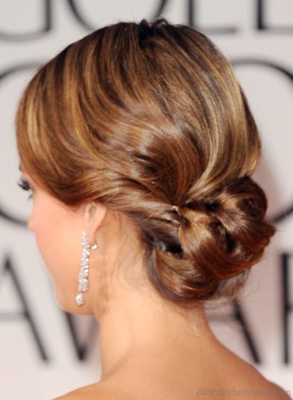 Relaxed Low Folded and Pinned Updo Hairstyle 