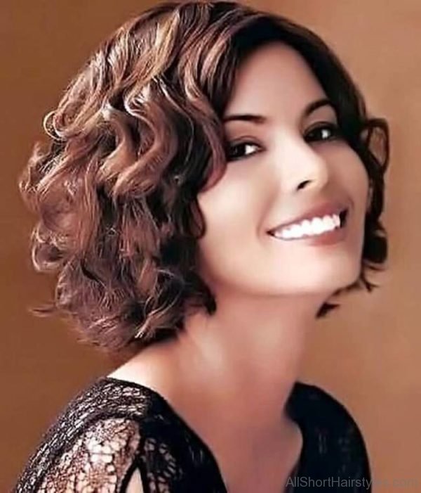 Short Curly Side Swept Hairstyle
