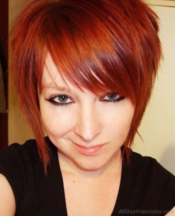 Short Red Hairstyle with Side Swept Bangs for Girls